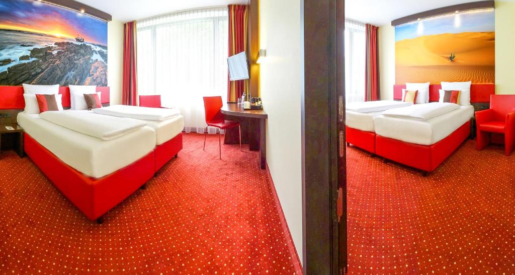 Семейный (Семейный номер с двумя двуспальными кроватями) отеля Best Western Plus Amedia Berlin Kurfürstendamm, Берлин