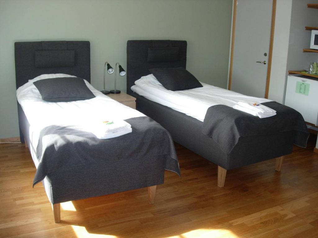 Двухместный (Стандартный двухместный номер с 2 отдельными кроватями) отеля Hotell Valsaren, Вестерос