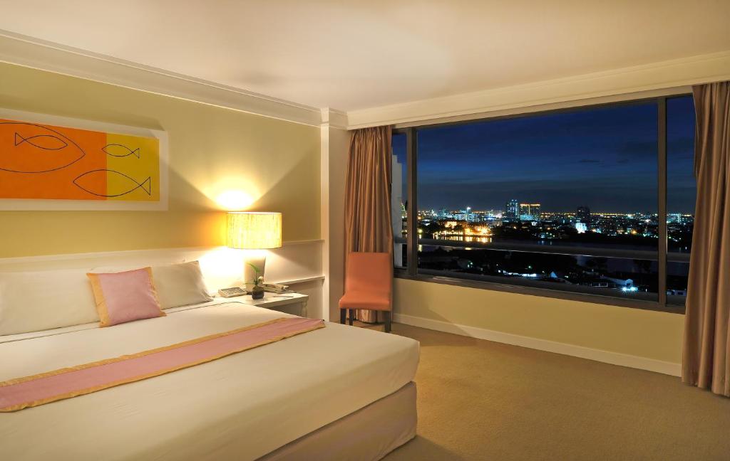 Двухместный (Улучшенный двухместный номер с 1 кроватью или 2 отдельными кроватями, вид на реку) отеля Tongtara Riverview, Бангкок