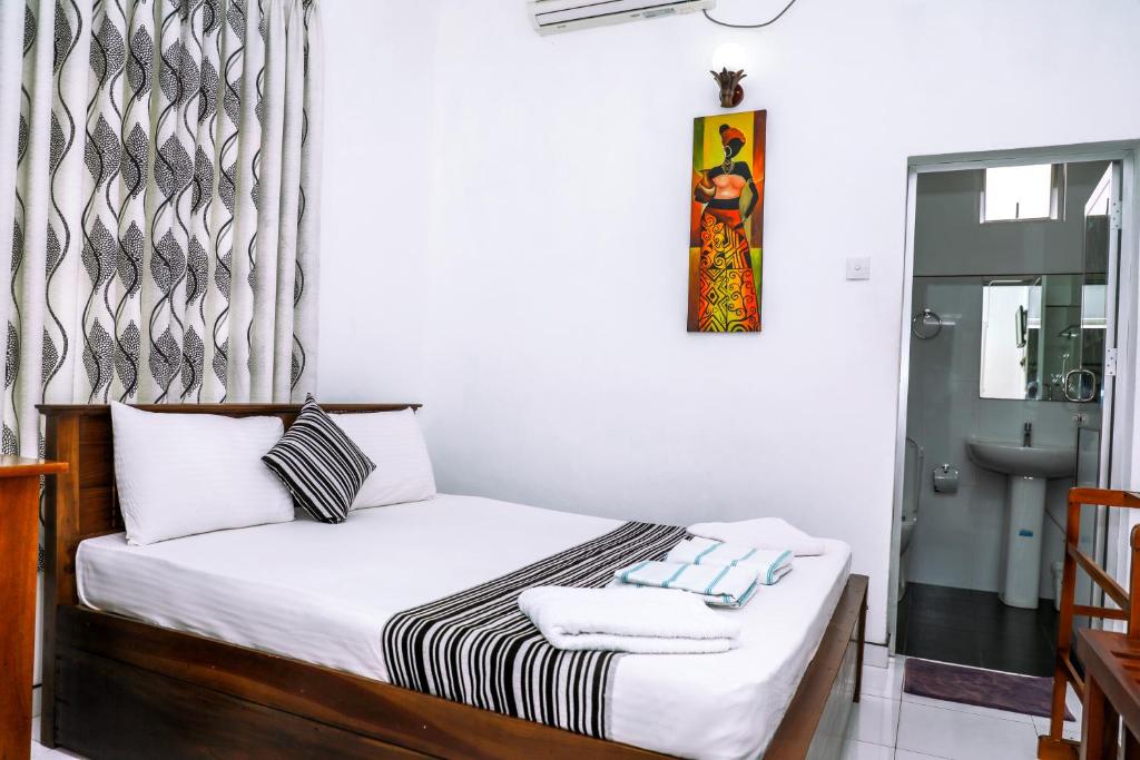 Двухместный (Двухместный номер Делюкс с 1 кроватью) отеля Bon Voyaage Tourist Inn, Тринкомали