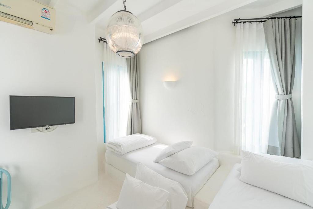 Двухместный (Двухместный номер Делюкс с 2 отдельными кроватями и террасой) курортного отеля Resort de Paskani, Хуахин