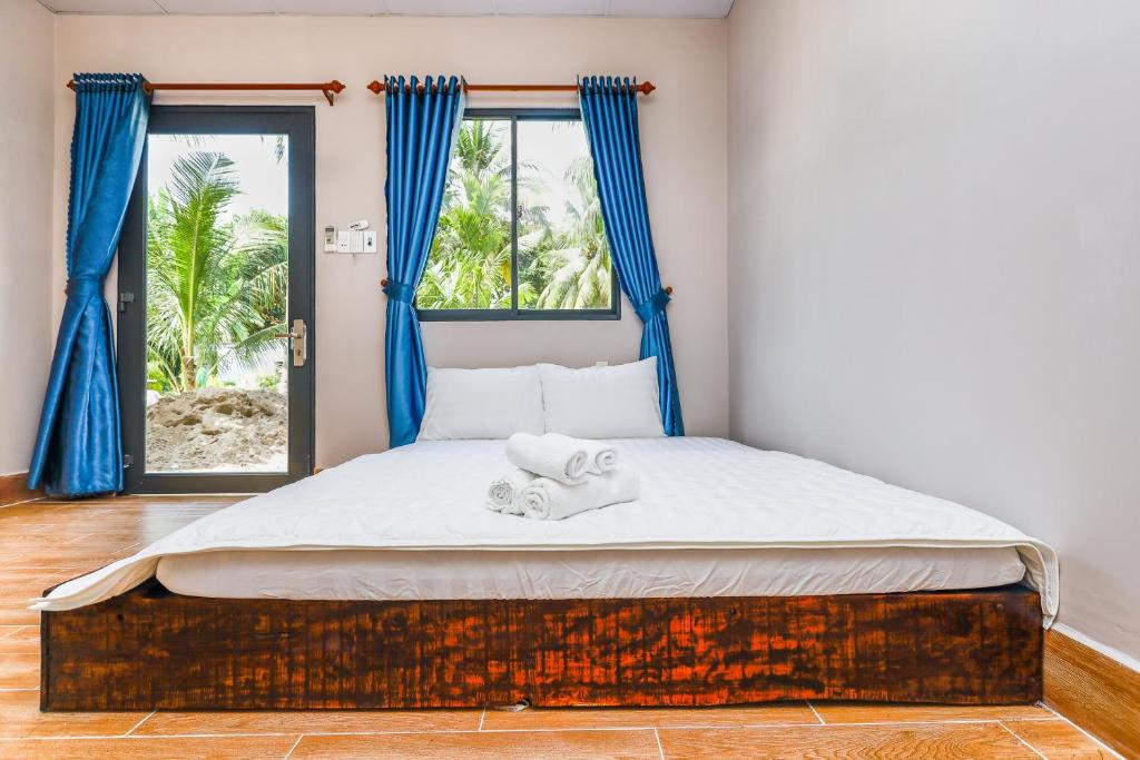 Двухместный (Двухместный номер с 1 кроватью, вид на сад) семейного отеля Local Beach Phu Quoc, Дуонг-Донг