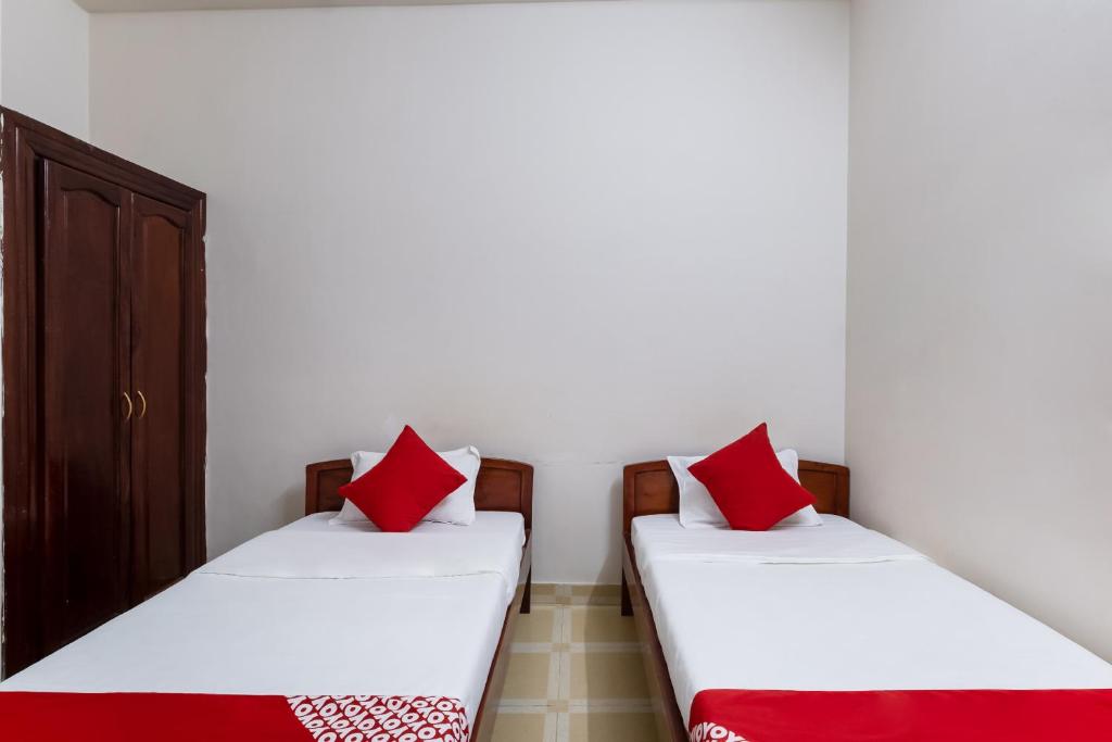 Двухместный (Стандартный двухместный номер с 2 отдельными кроватями) гостевого дома OYO 390 Hoa Cat Hotel, Дуонг-Донг