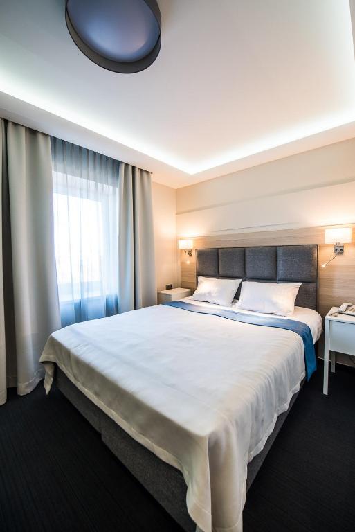 Двухместный (Небольшой двухместный номер с 1 кроватью или 2 отдельными кроватями) отеля Europa City Amrita Hotel, Лиепая