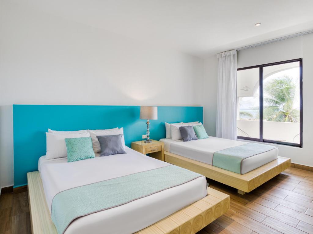 Двухместный (Стандартный двухместный номер) отеля Ojo de Agua Beach Front Hotel, Пуэрто-Морелос