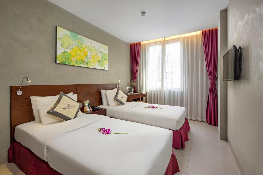 Двухместный (Двухместный номер Делюкс с 1 кроватью или 2 отдельными кроватями, вид на город) отеля Sen Boutique Hotel, Дананг
