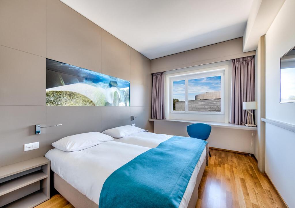 Двухместный (Стандартный двухместный номер с 1 кроватью или 2 отдельными кроватями) отеля Aquatis Hotel, Лозанна