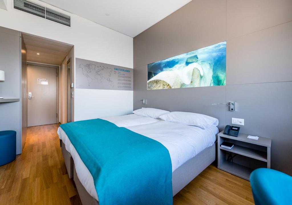 Двухместный (Двухместный номер Делюкс с 1 кроватью или 2 отдельными кроватями, вид на город) отеля Aquatis Hotel, Лозанна