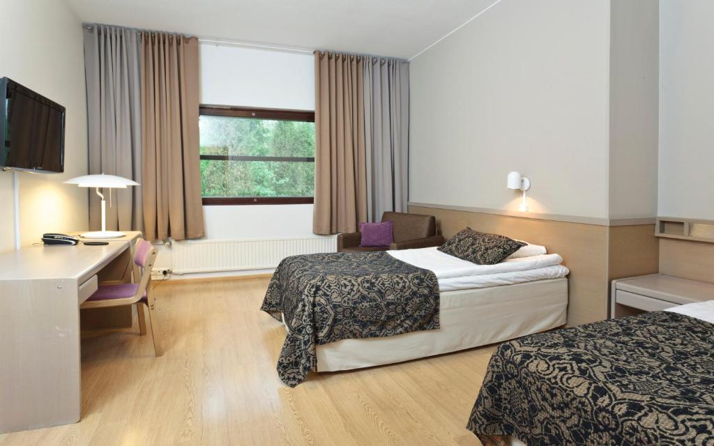 Двухместный (Стандартный двухместный номер с 2 отдельными кроватями) отеля Hotelli Nuuksio, Эспоо