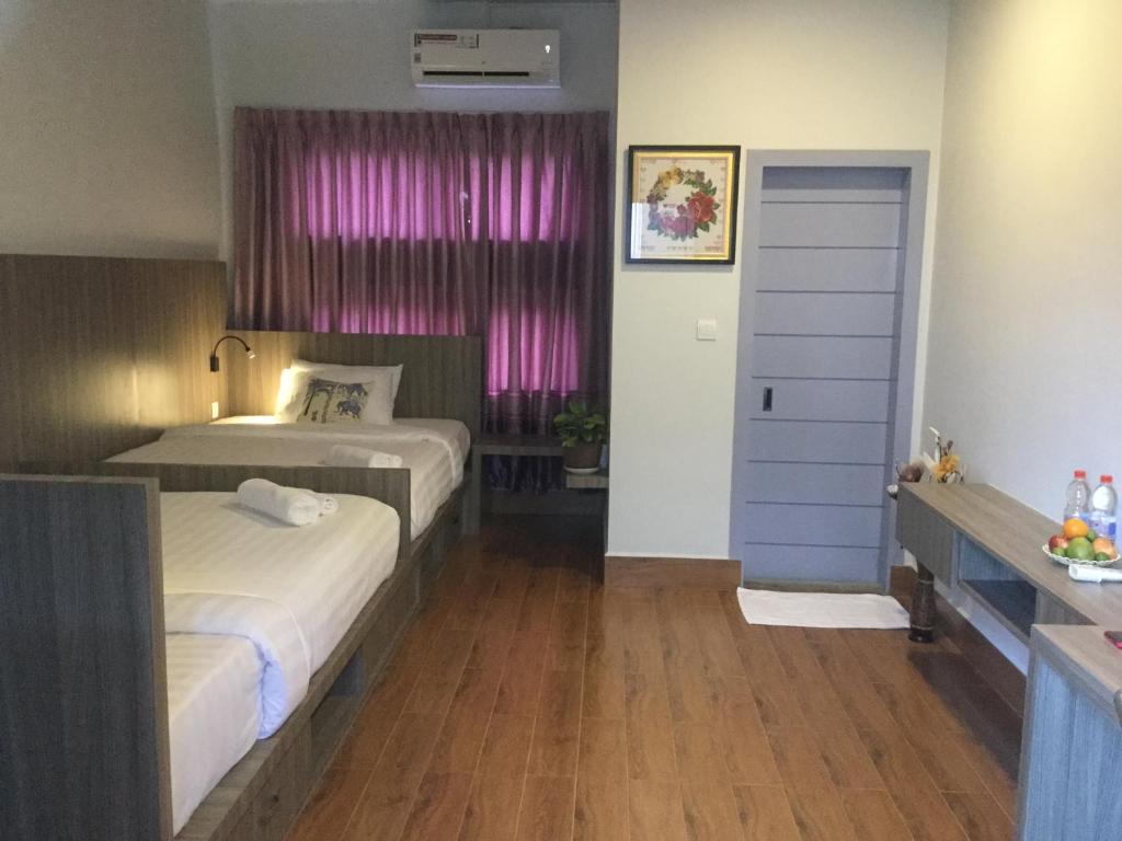 Двухместный (Двухместный номер Делюкс с 2 отдельными кроватями) апарт-отеля 2N Residence, Сием Рип