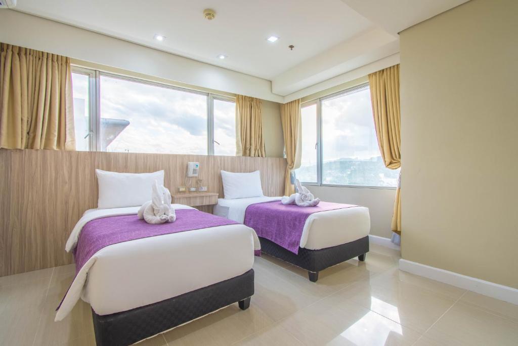 Сьюит (Улучшенный люкс с 2 спальнями) апарт-отеля Alicia Apartelle, Себу