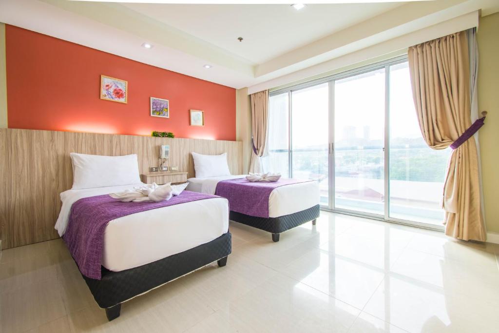 Двухместный (Улучшенный люкс с 1 спальней) апарт-отеля Alicia Apartelle, Себу