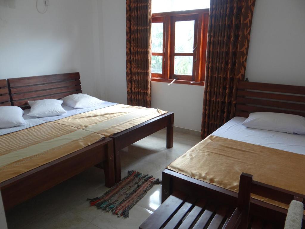 Семейный (Улучшенный семейный номер) семейного отеля Kumudu Holiday Home, Анурадхапура