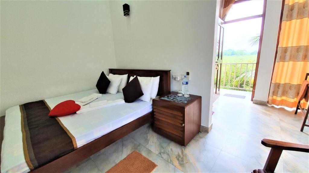 Двухместный (Большой двухместный номер с 1 кроватью или 2 отдельными кроватями) отеля Dhammika Magic Palace, Ваддува