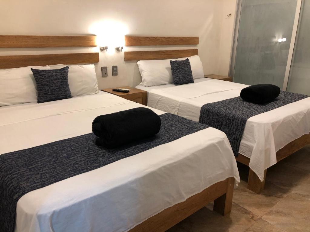 Двухместный (Стандартный двухместный номер с 1 кроватью или 2 отдельными кроватями) отеля 15 AVENIDA, Тапачула