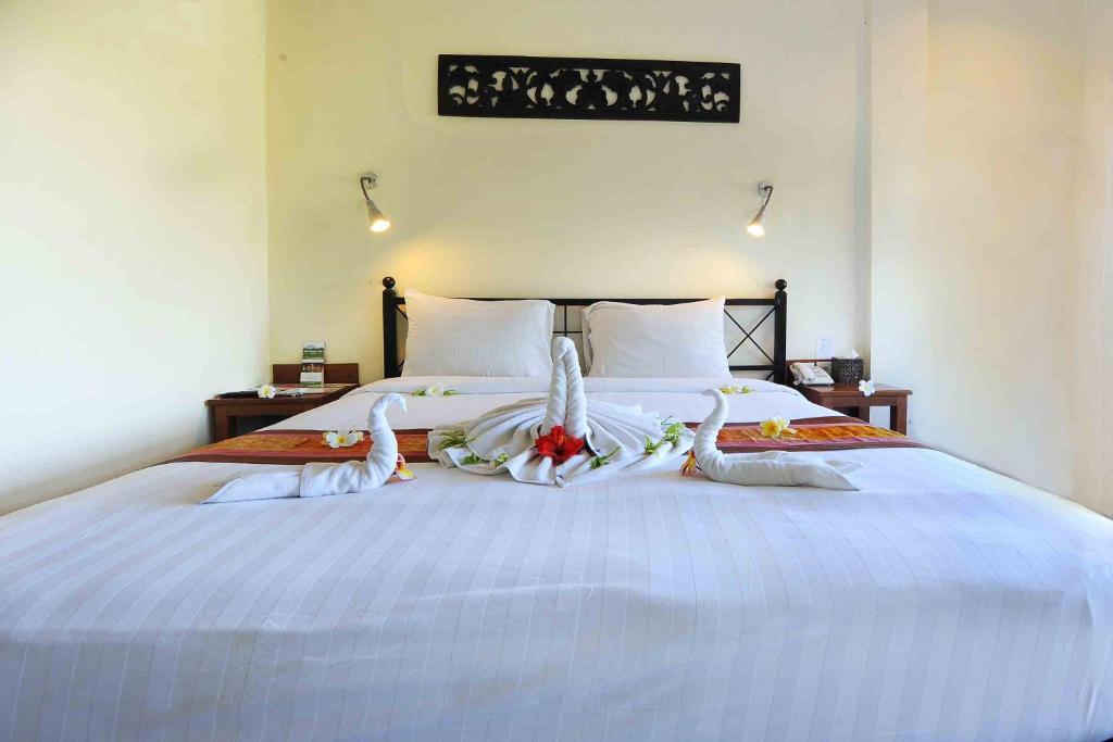 Двухместный (Бюджетный двухместный номер с 1 кроватью или 2 отдельными кроватями) отеля Suly Vegetarian Resort & Spa, Убуд