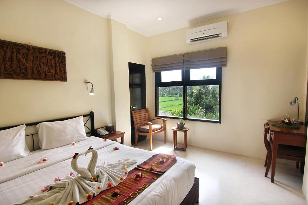 Двухместный (Стандартный двухместный номер с 1 кроватью и видом на рисовое поле) отеля Suly Vegetarian Resort & Spa, Убуд