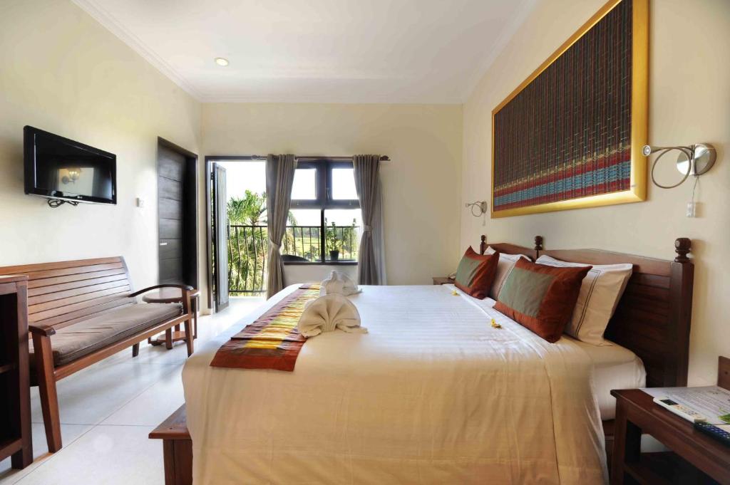 Двухместный (Двухместный номер Делюкс с 1 кроватью и видом на рисовые поля) отеля Suly Vegetarian Resort & Spa, Убуд
