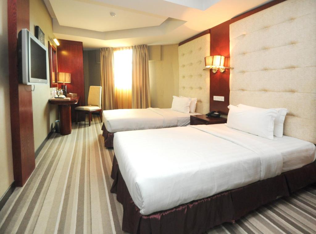 Двухместный (Двухместный номер Делюкс с 2 отдельными кроватями) отеля Celyn City Hotel, Кота-Кинабалу