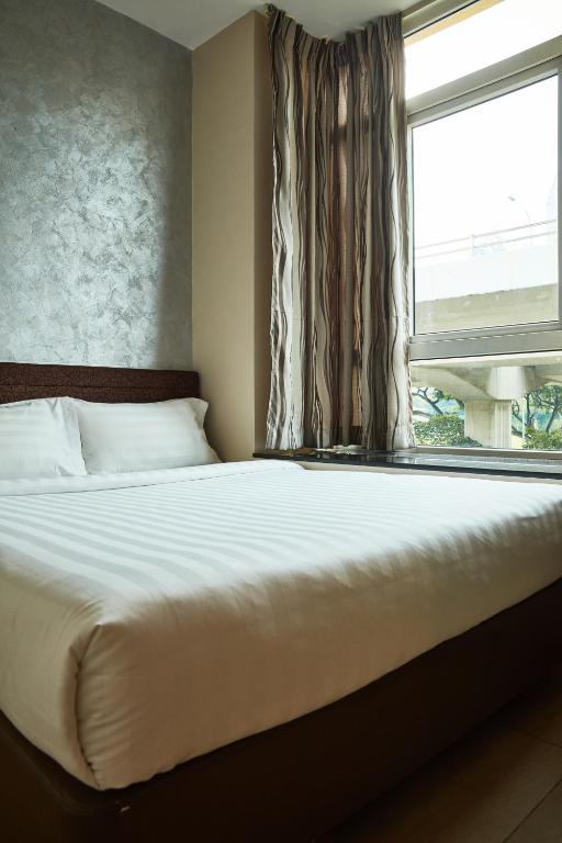 Двухместный (Улучшенный двухместный номер с 1 кроватью) отеля Fragrance Hotel - Royal, Сингапур (город)