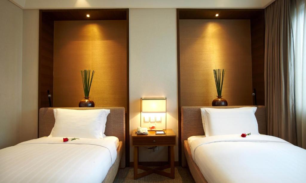 Двухместный (Двухместный номер Делюкс с 2 отдельными кроватями) отеля Harriway Hotel, Чэнду