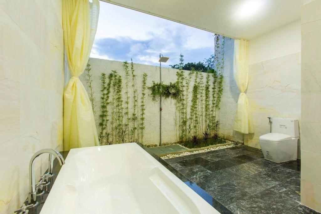 Двухместный (Уютный двухместный номер с 1 кроватью или 2 отдельными кроватями) виллы Hoi An Hideaway Villa, Хойан
