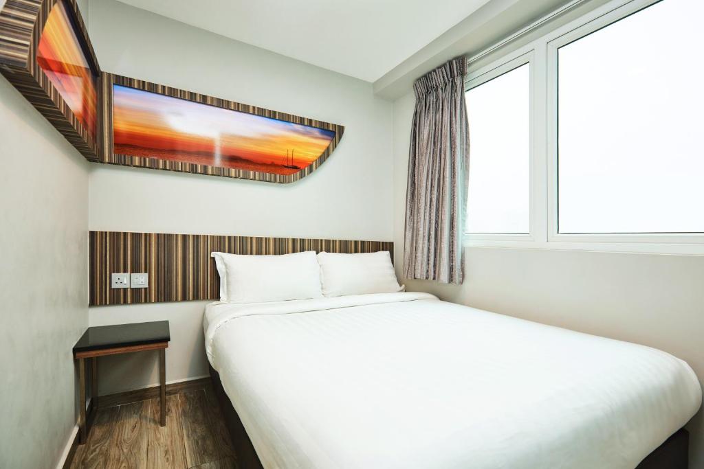 Двухместный (Двухместный номер с 1 кроватью в коттедже) отеля Fragrance Hotel - Selegie, Сингапур (город)