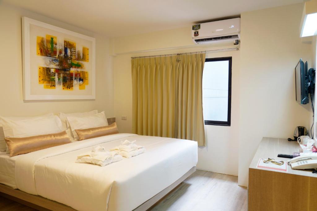 Двухместный (Улучшенный двухместный номер с 1 кроватью и окном) отеля Sawasdee House, Бангкок