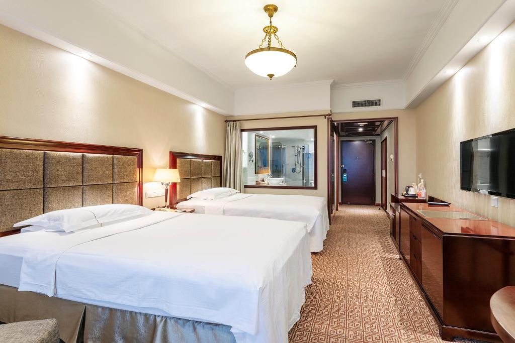 Двухместный (Стандартный двухместный номер с 2 отдельными кроватями) отеля Grand Regency Hotel, Циндао