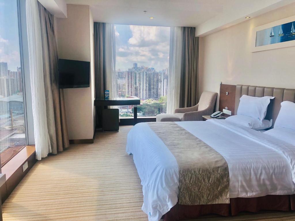 Двухместный (Executive King room with Seaview), L Hotels Changsheng Branch