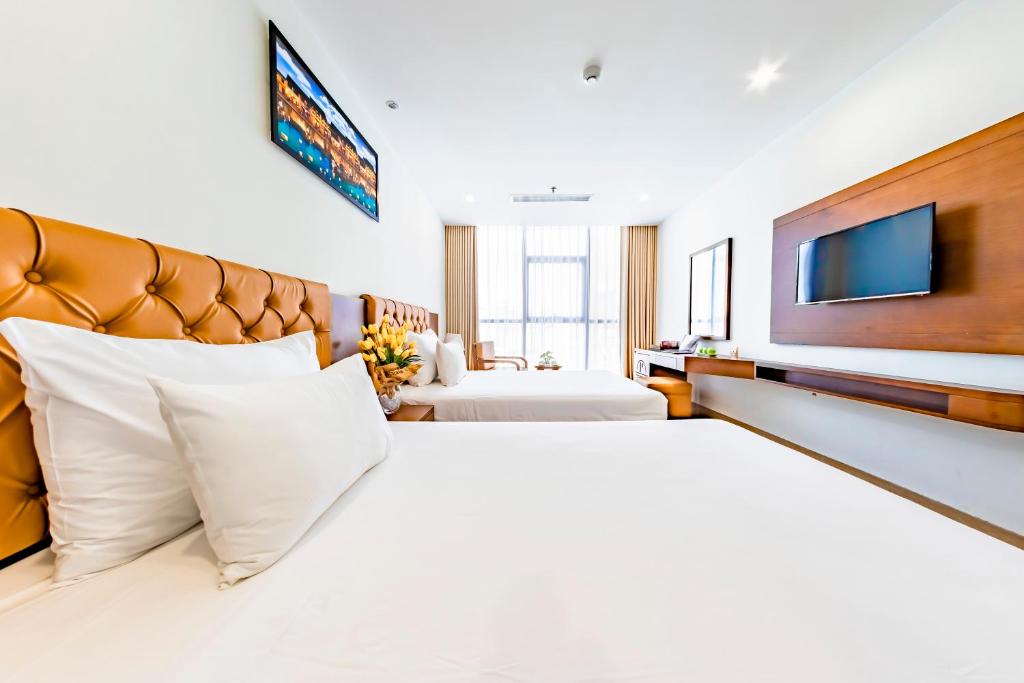 Двухместный (Двухместный номер Делюкс с 2 отдельными кроватями и видом на город) отеля Pandora Boutique Da Nang Hotel, Дананг