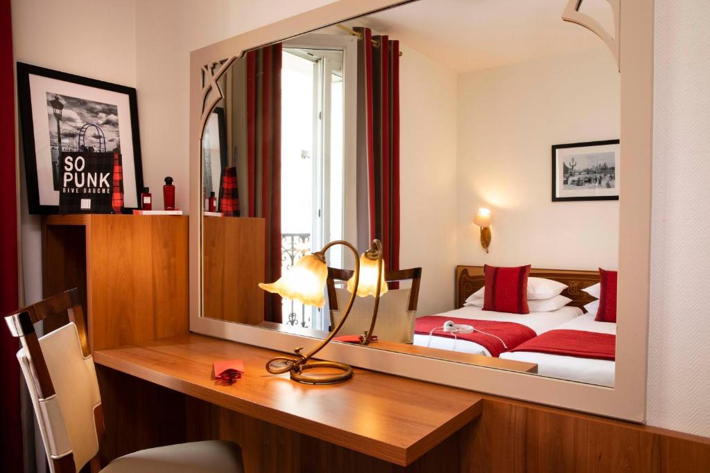 Двухместный (Классический двухместный номер с 2 отдельными кроватями) отеля Grand Hotel des Balcons, Париж
