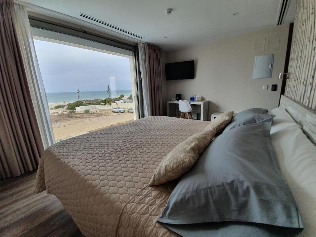 Двухместный (Двухместный номер Делюкс с 1 кроватью или 2 отдельными кроватями и видом на море) отеля Hotel Boutique Aroma de Mar, Кадис