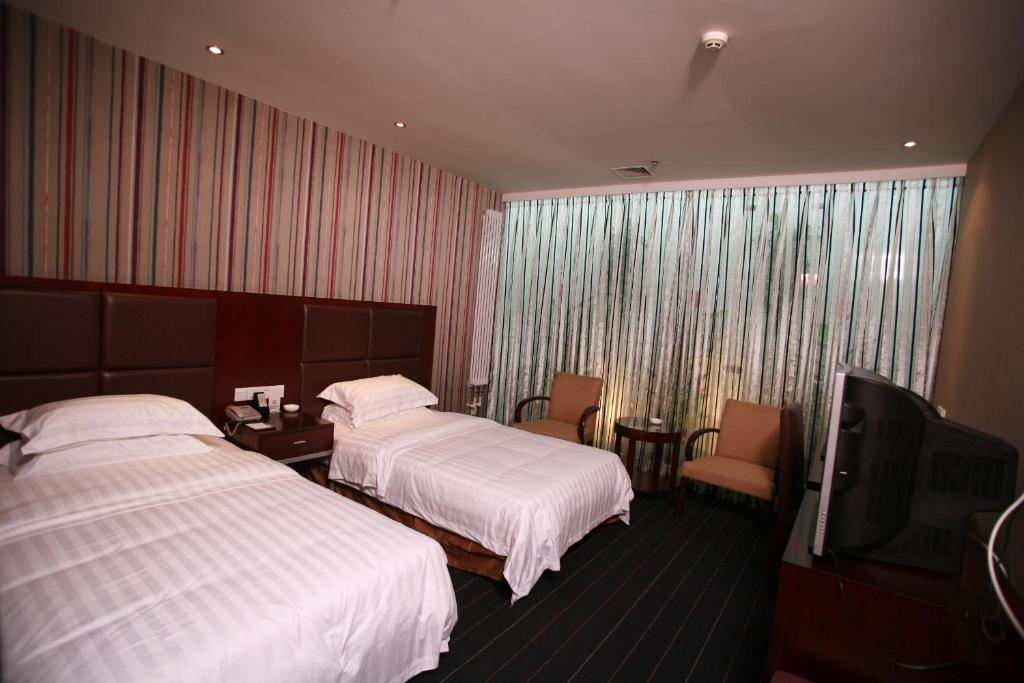 Двухместный (Улучшенный двухместный номер с 2 отдельными кроватями) отеля Starway Hotel Beijing Shaoyaoju, Пекин