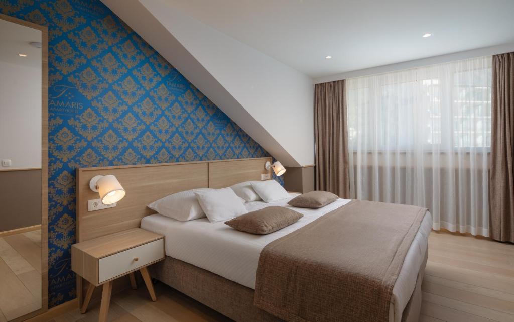 Двухместный (Двухместный номер эконом-класса с 1 кроватью или 2 отдельными кроватями, вид на горы - Мансарда) отеля Hotel Tamaris, Тучепи