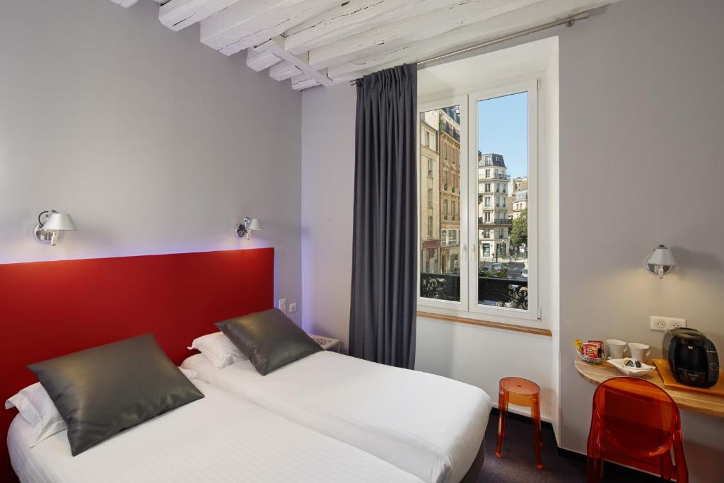 Двухместный (Двухместный номер «Комфорт» с 2 отдельными кроватями) отеля Hôtel Ecole Centrale, Париж