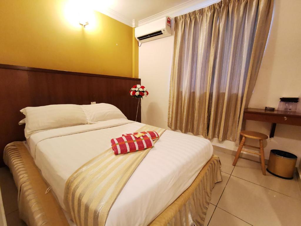 Двухместный (Улучшенный двухместный номер с 2 отдельными кроватями) мотеля Sunderland Motel, Лангкави