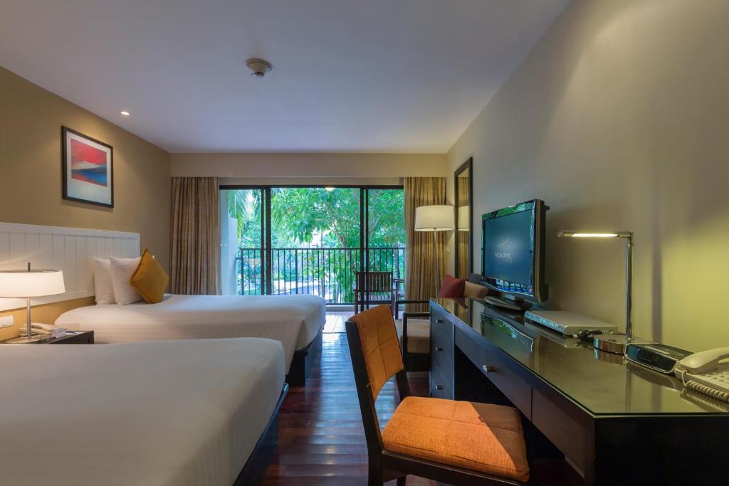 Двухместный (Улучшенный двухместный номер с 2 отдельными кроватями) отеля Novotel Phuket Surin Beach Resort, Пхукет