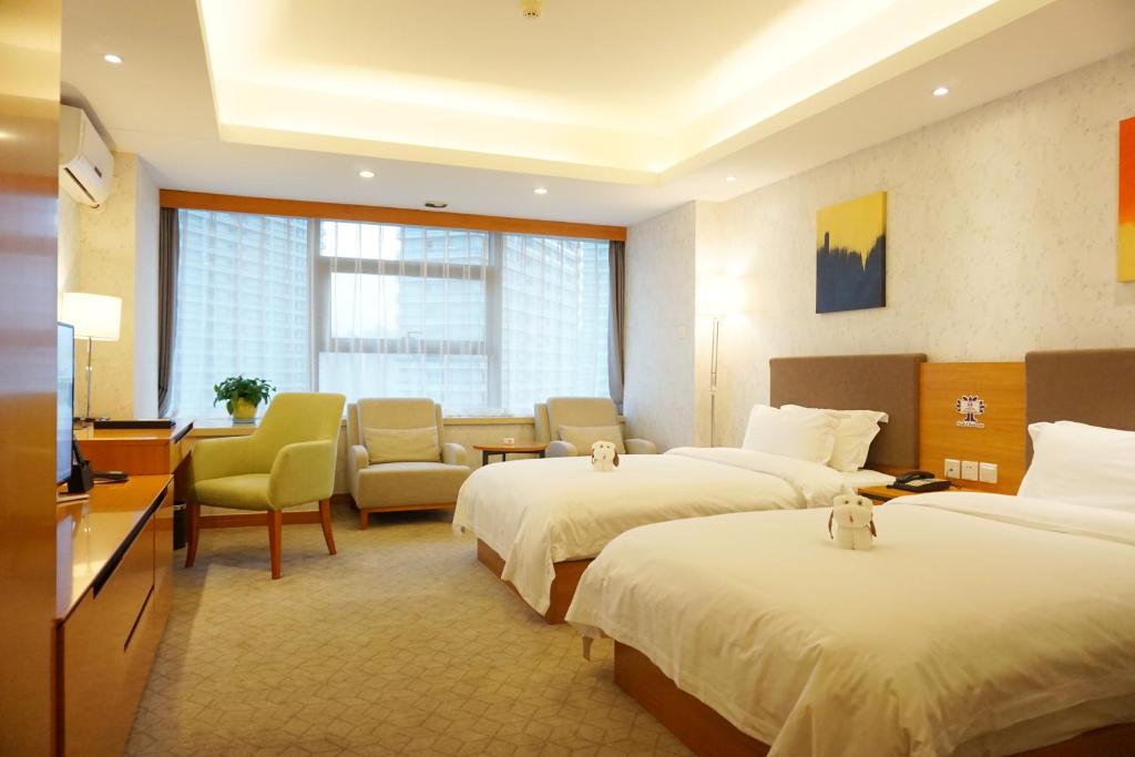Двухместный (Двухместный номер бизнес-класса с 2 отдельными кроватями) отеля Dalian Oak Chateau, Далянь