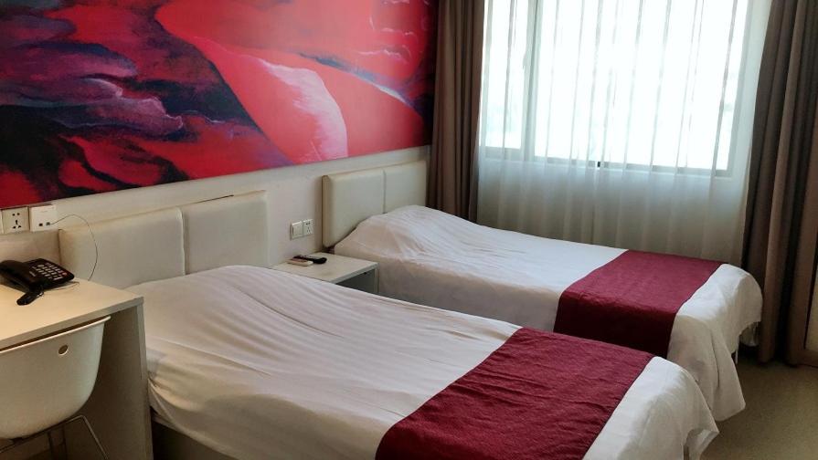 Двухместный (Стандартный двухместный номер с 2 отдельными кроватями) отеля Genting Star Shanghai, Шанхай