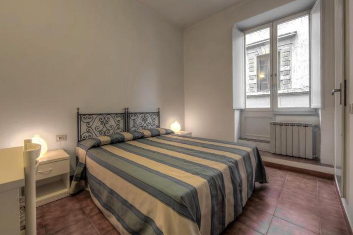 Двухместный (Двухместный номер с 1 кроватью или 2 отдельными кроватями, общая ванная комната) отеля Hotel Aldobrandini, Флоренция