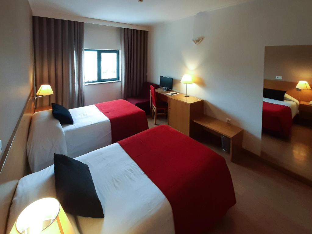 Двухместный (Двухместный номер с 2 отдельными кроватями) отеля Hotel Durao, Визеу