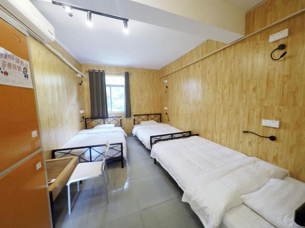 Номер (Кровать в общем трехместном номере для женщин) хостела Catalpa Garden Youth Hostel, Гуанчжоу