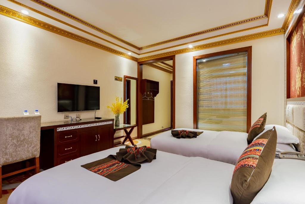 Двухместный (Специальное предложение - Двухместный номер с 2 отдельными кроватями) хостела Hui Fu Hua Hostel, Шангри-Ла (Тибет)