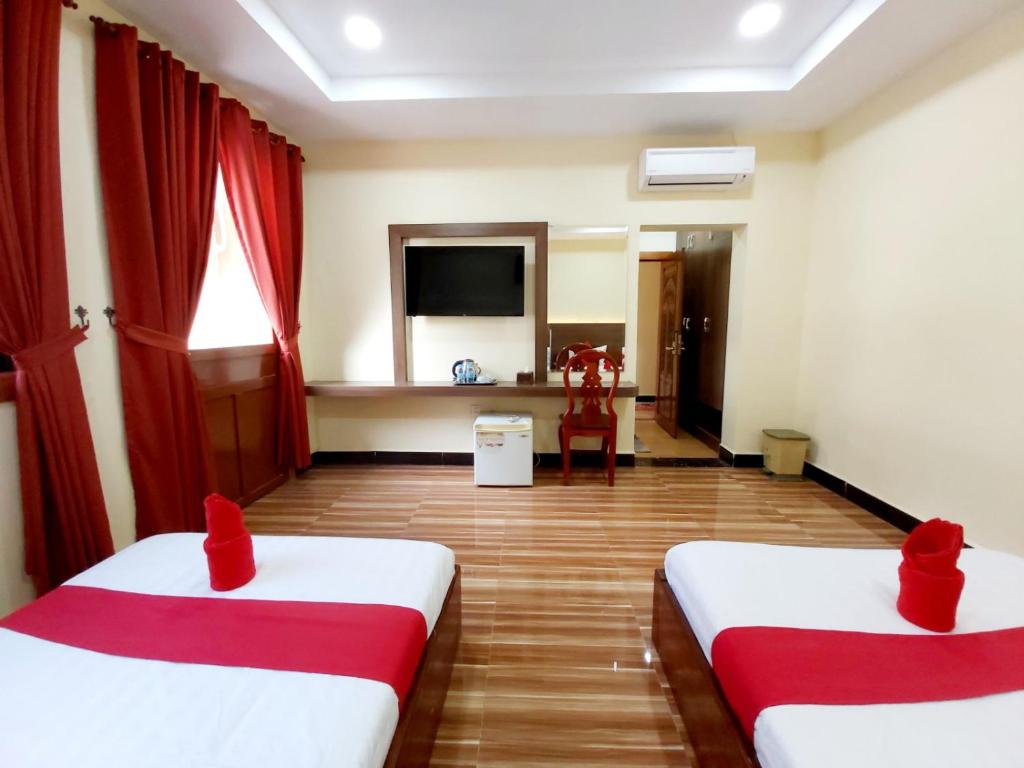 Двухместный (Двухместный номер Делюкс с 2 отдельными кроватями) отеля Capitol One, Пномпень