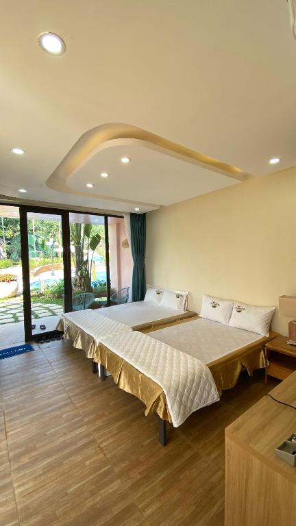 Трехместный (Трехместный номер Делюкс) курортного отеля May Tropical Villas, Ханой