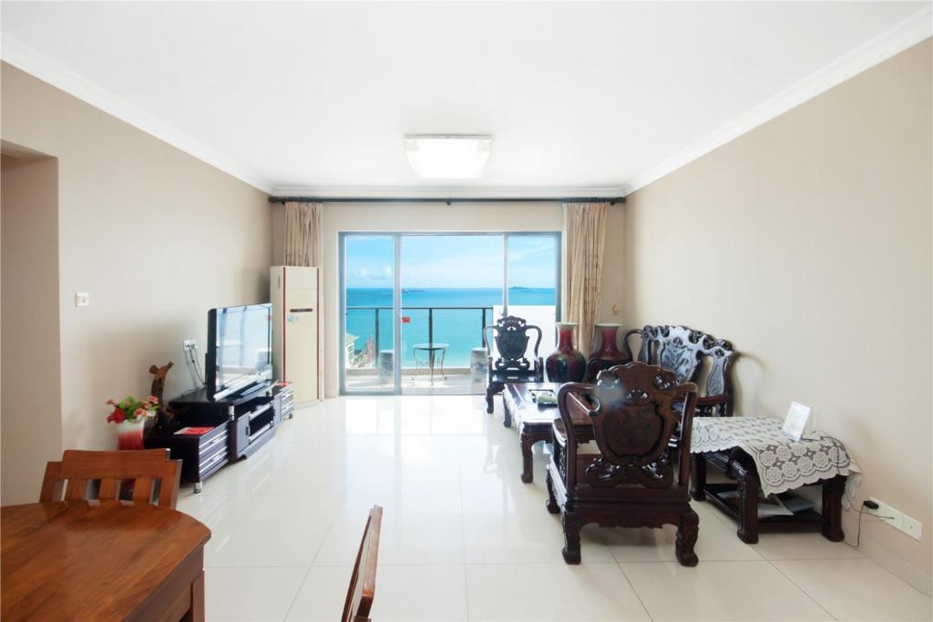Апартаменты (Four-Bedroom Apartment (8 Adults) with Sea View- Mainland China only) апартамента Sanya Qingjinghaiwan Apartment, Санья