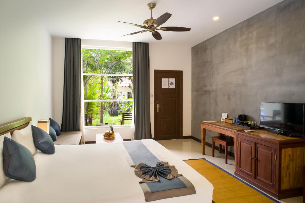 Двухместный (Двухместный номер с 1 кроватью и видом на сад - Бесплатный трансфер из аэропорта) виллы Angkor Mango Tree Boutique Hotel, Сием Рип
