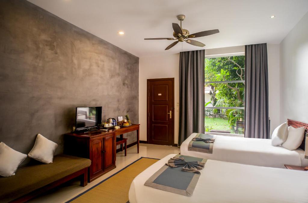 Двухместный (Twin Room with Garden View - Free Airport Pick Up) виллы Angkor Mango Tree Boutique Hotel, Сием Рип