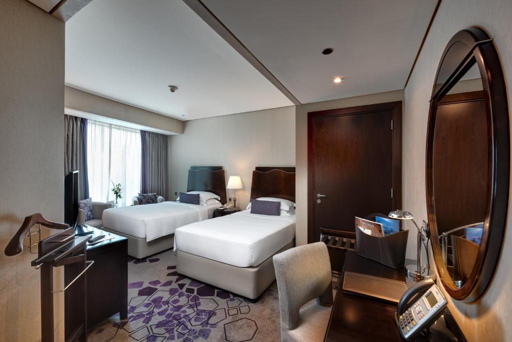 Двухместный (Классический двухместный номер с 2 отдельными кроватями) отеля Rose Rayhaan by Rotana - Dubai, Дубай